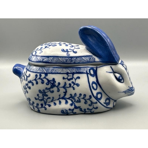 255 - A blue and white ceramic rabbit trinket box with lid, unmarked, 12cm (h)  / All lots are located at ... 