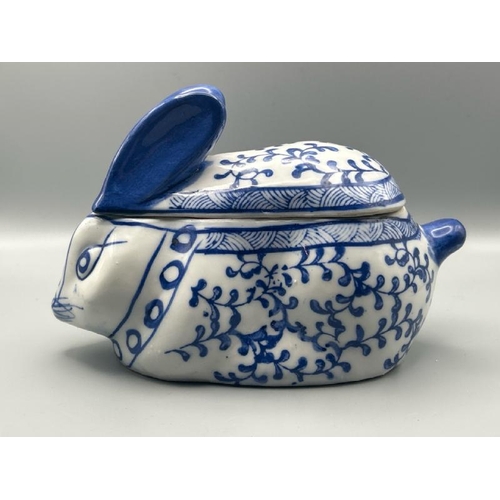 255 - A blue and white ceramic rabbit trinket box with lid, unmarked, 12cm (h)  / All lots are located at ... 