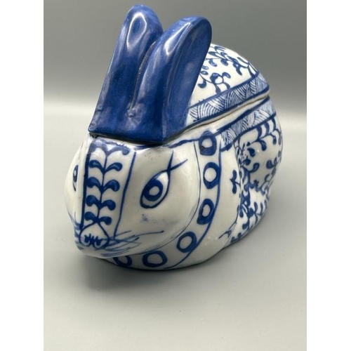 255 - A blue and white ceramic rabbit trinket box with lid, unmarked, 12cm (h)  / All lots are located at ... 