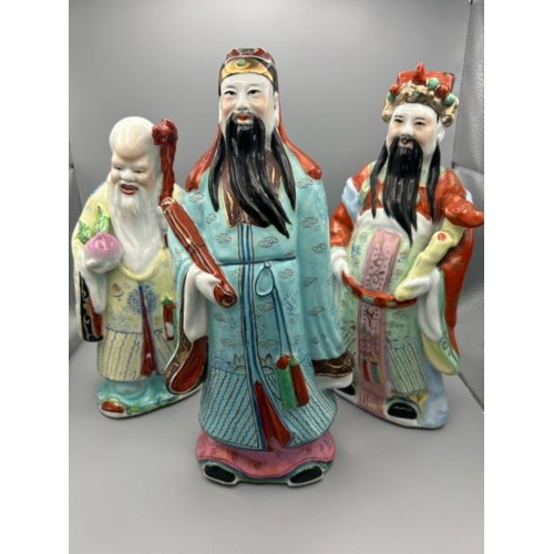 294 - Three porcelain figurines of Chinese Famille Rose Sanxing Gods, Fu Lu Shou, tallest 28cm (h)  / All ... 