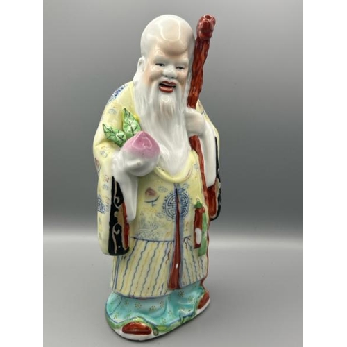 294 - Three porcelain figurines of Chinese Famille Rose Sanxing Gods, Fu Lu Shou, tallest 28cm (h)  / All ... 