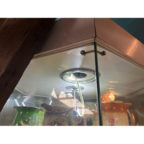 295 - Hexagonal display cabinet, four circular glass shelves, currently lit with an LED strip light, with ... 