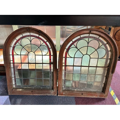 306 - A pair of framed stained glass windows, 77cm (h) x 57cm (w)  / All lots are located at Gower Reclama... 