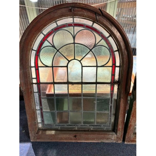 306 - A pair of framed stained glass windows, 77cm (h) x 57cm (w)  / All lots are located at Gower Reclama... 