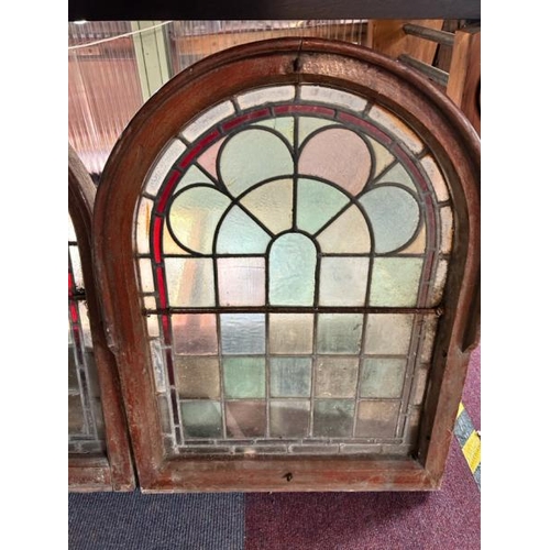 306 - A pair of framed stained glass windows, 77cm (h) x 57cm (w)  / All lots are located at Gower Reclama... 