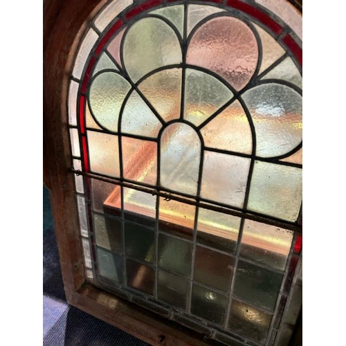 306 - A pair of framed stained glass windows, 77cm (h) x 57cm (w)  / All lots are located at Gower Reclama... 