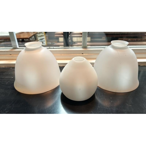 31 - A matching pair of milky white light art deco light shades (one cracked), and another, largest 15.5c... 