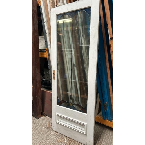 336 - Three doors with stained glass lead lined panels, largest panel 140cm (h) x 53cm (w)  / All lots are... 