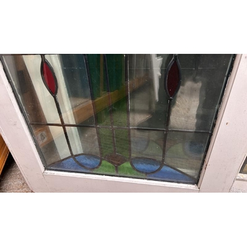 336 - Three doors with stained glass lead lined panels, largest panel 140cm (h) x 53cm (w)  / All lots are... 