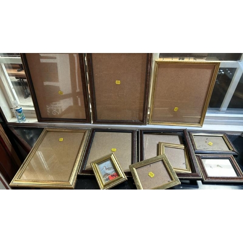 47 - Eleven assorted frames, some with glazing, largest 86cm (h) x 64cm (w)  / All lots are located at Go... 