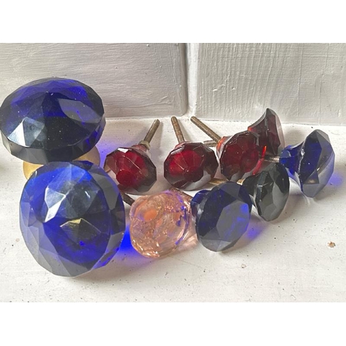 505 - Ten assorted blue and red glass draw handles and door handles  / All lots are located at Gower Recla... 