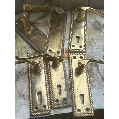 512 - Six brass door handles with roped edges  / All lots are located at Gower Reclamation, Unit 17b, Crof... 