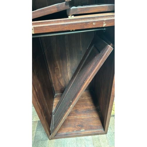 52 - An oak cupboard with carved panel doors and two compartments, 158cm (h) x 60cm (w) x 60cm (d)  / All... 