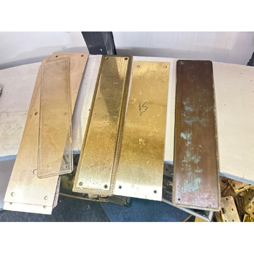 521 - Three vintage brass door pushplates with assorted wooden backplates  / All lots are located at Gower... 