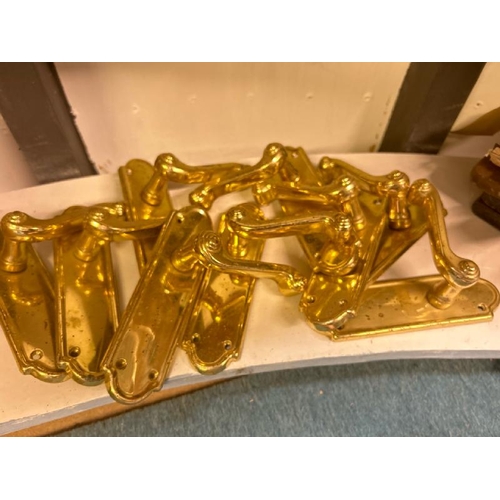 534 - Nine matching brass door handles with backplates, 17cm (h)  / All lots are located at Gower Reclamat... 