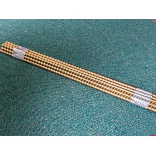 556 - Twelve brass rods, each 70cm  / All lots are located at Gower Reclamation, Unit 17b, Crofty Industri... 