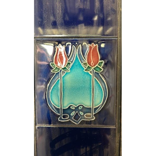 569 - Half set of art nouveau blue fireplace tiles, each 14x15.5cm, with metal tile holder  / All lots are... 