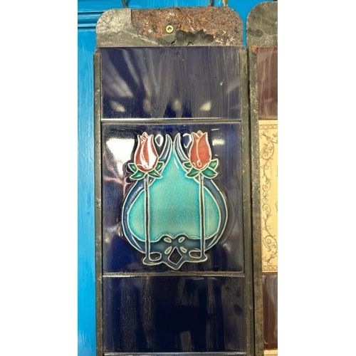 569 - Half set of art nouveau blue fireplace tiles, each 14x15.5cm, with metal tile holder  / All lots are... 