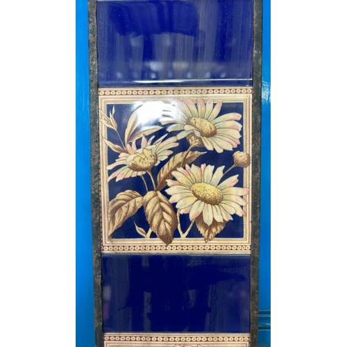 572 - Half set of three H&R Johnson fireplace tiles, each 14.5x16cm, with metal tile holder  / All lots ar... 