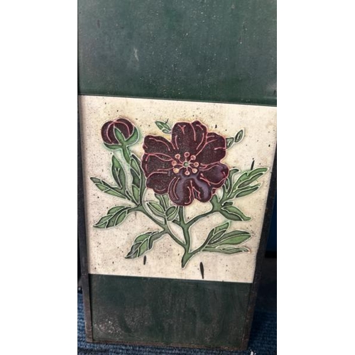 577 - Half set of poppy fireplace tiles, each 15x15.5cm, with metal tile holder  / All lots are located at... 