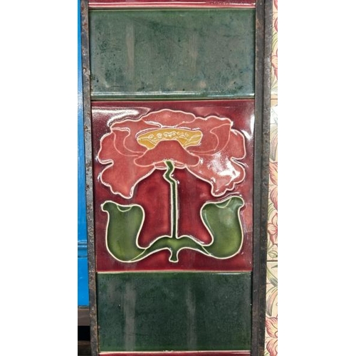 588 - Half set of art nouveau poppy fireplace tiles, each 15x15cm, with metal tile holder  / All lots are ... 