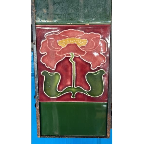 588 - Half set of art nouveau poppy fireplace tiles, each 15x15cm, with metal tile holder  / All lots are ... 