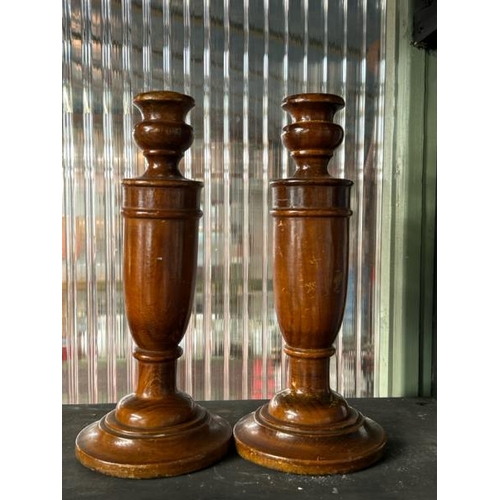 606 - Pair of turned wooden candle holders, 27cm (h)  / All lots are located at Gower Reclamation, Unit 17... 