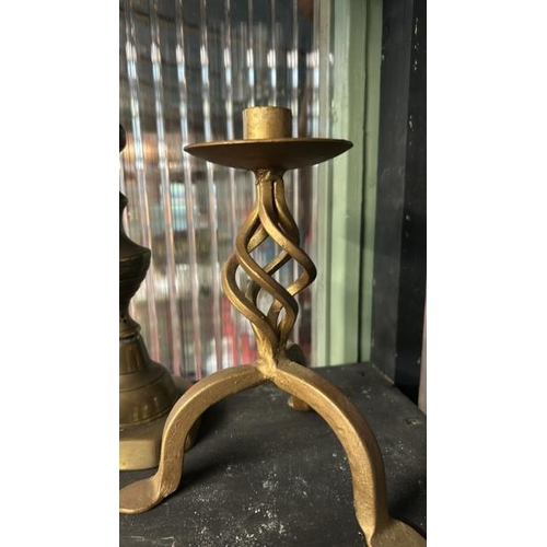 607 - Three brass candle holders including two of twisted form, tallest 28cm (h)  / All lots are located a... 