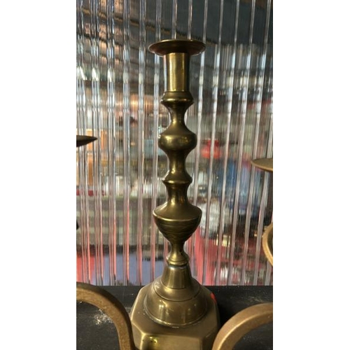 607 - Three brass candle holders including two of twisted form, tallest 28cm (h)  / All lots are located a... 