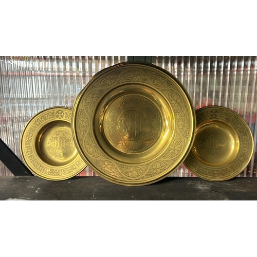 608 - Three brass church donation dishes, two by Jones and Willis with inscription dated 1900, largest is ... 