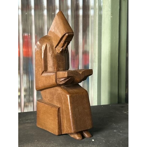 609 - Carved figure and wooden bible stand with felt base, 24cm (h)  / All lots are located at Gower Recla... 