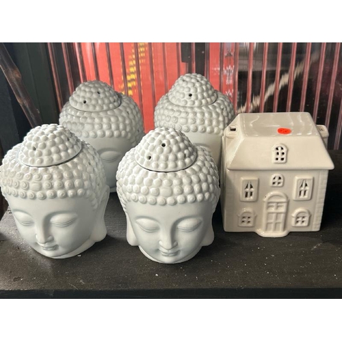 617 - Four new buddha head wax melt burners and house wax melt burner  / All lots are located at Gower Rec... 