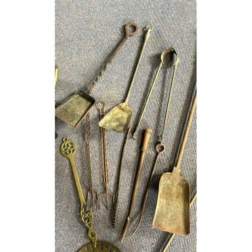 619 - Collection of vintage brass and metal fire tools including shovels, tongs and chestnut warmer  / All... 