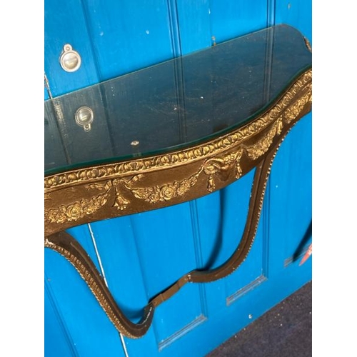 627 - Glass topped guilded console table, 76x60x28cm  / All lots are located at Gower Reclamation, Unit 17... 