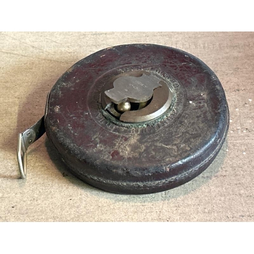 633 - Vintage John Rabone & Sons 100 foot metal measuring tape number 4211  / All lots are located at Gowe... 