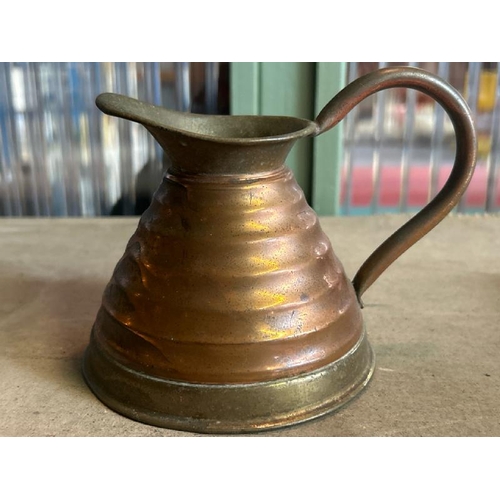 659 - Collection of brass and copperware including a Weberware copper jug, crumb brush and pan, twin handl... 