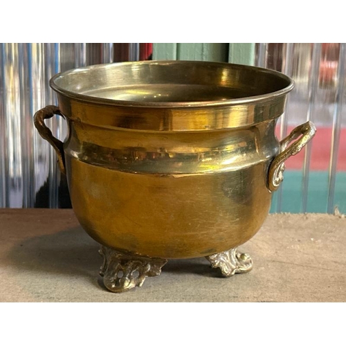 659 - Collection of brass and copperware including a Weberware copper jug, crumb brush and pan, twin handl... 