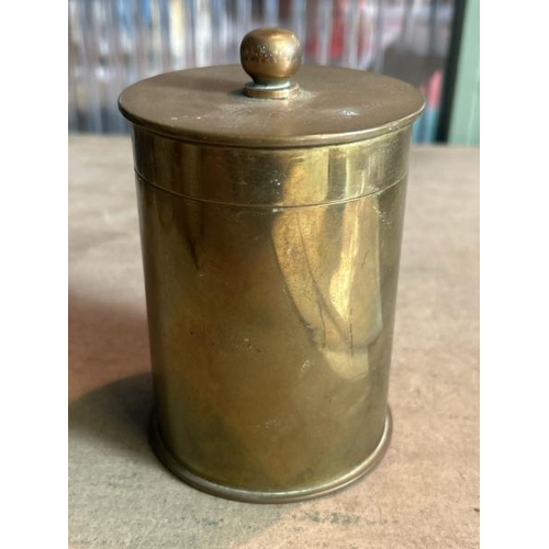 660 - Brass lidded pot made from an artillery shell, 11.5cm high 8.5cm diameter  / All lots are located at... 