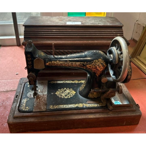 71 - A vintage Singer sewing machine with case, serial no. BJ288963  / All lots are located at Gower Recl... 