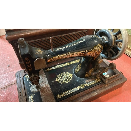 71 - A vintage Singer sewing machine with case, serial no. BJ288963  / All lots are located at Gower Recl... 