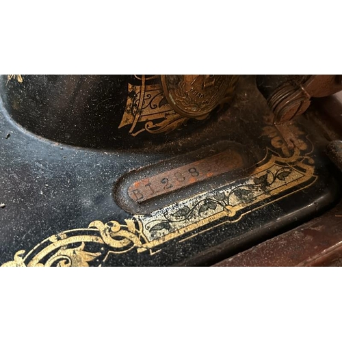 71 - A vintage Singer sewing machine with case, serial no. BJ288963  / All lots are located at Gower Recl... 