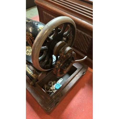 71 - A vintage Singer sewing machine with case, serial no. BJ288963  / All lots are located at Gower Recl... 