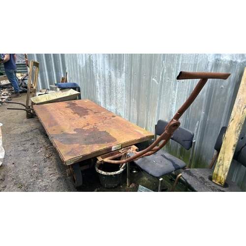 742 - A vintage four wheel flatbed trolley by Young Man London and Crawley, bed dimensions 47cm (h) x 214c... 