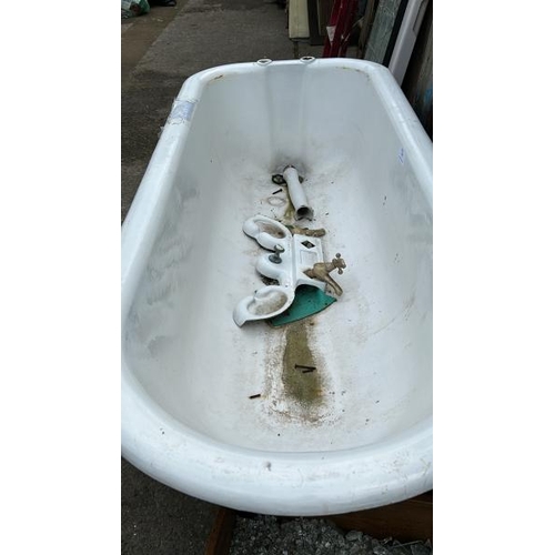 746 - A Victorian cast iron bath on ball and claw feet, 55cm (h) x 180cm (l) x 74cm (w)  / All lots are lo... 