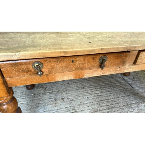 749 - A four drawer oak kitchen table, 74cm (h) x 76cm (d) x 153cm (w), in need of some restoration  / All... 