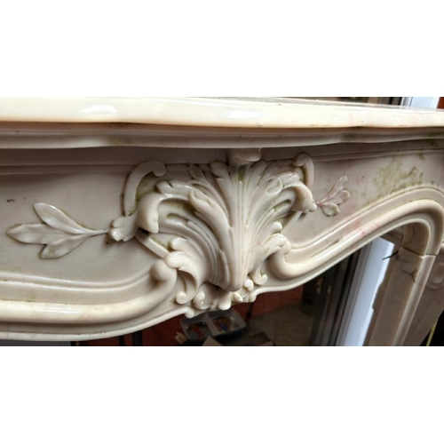 758 - A white marble resin copy fireplace surround, on authentic white marble base, profusely decorated wi... 