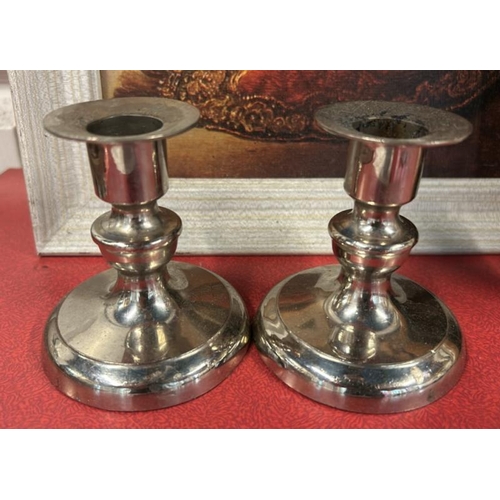 76 - A pair of candle stick holders, possibly made in West Germany, 10cm (h)  / All lots are located at G... 