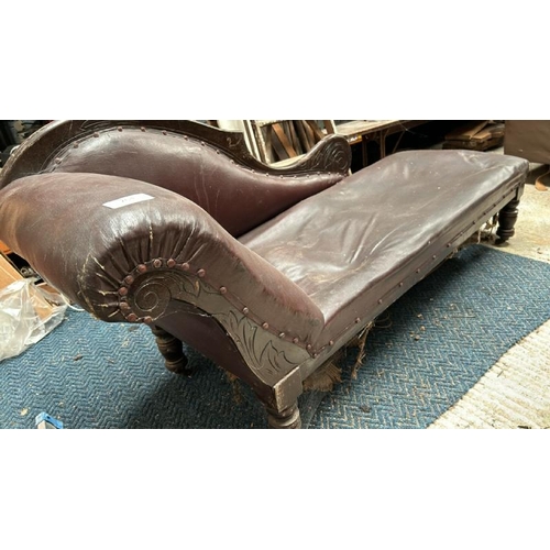 764 - Victorian chaise longue, with leather upholstery and carved wooden detail throughout, on turned and ... 