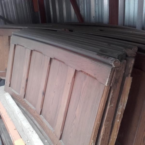 774 - A large collection of curved pitch pine church pew back panels  / All lots are located at Gower Recl... 