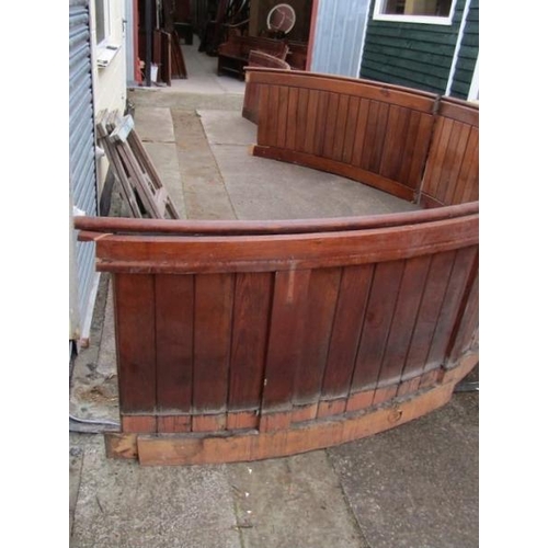 774 - A large collection of curved pitch pine church pew back panels  / All lots are located at Gower Recl... 